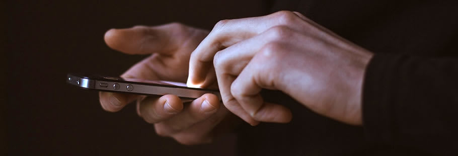 Hands using smartphone Hands using smartphone