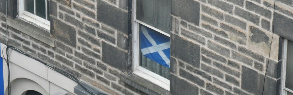 Scottish flag in window
