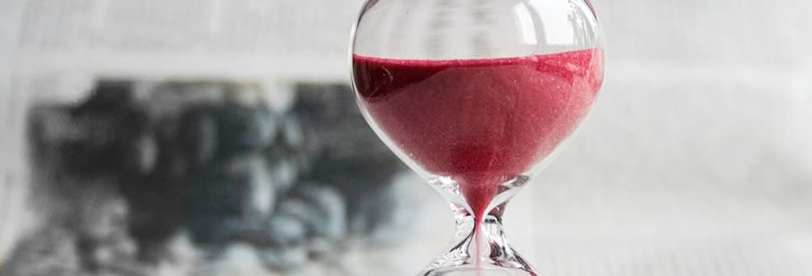 Hourglass with red sand