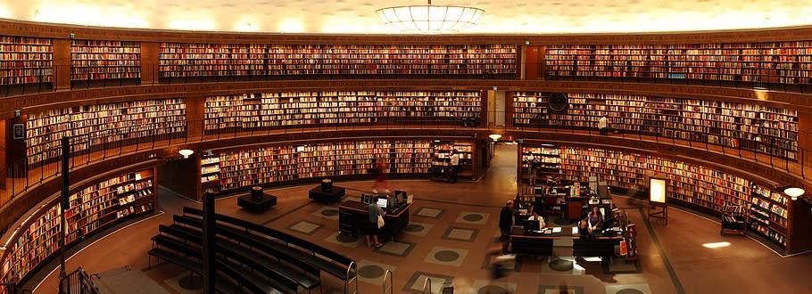 University library, bookshelves, computers and desks
