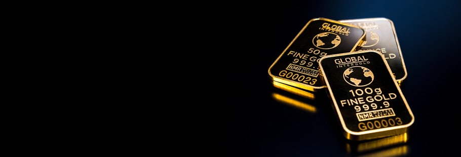 Gold bullion on black background