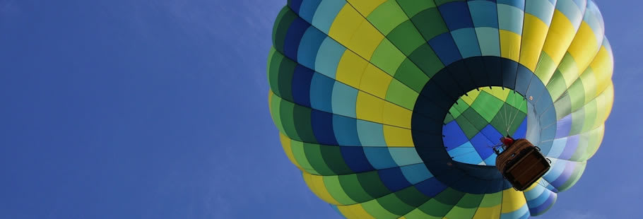 Hot air balloon in sky, from below