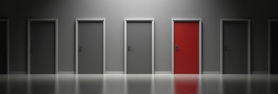 A series of doors, one red