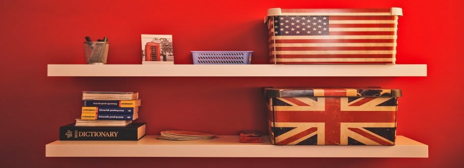 Shelves with USA flag on box on the top shelf and Union Jack flag on box below