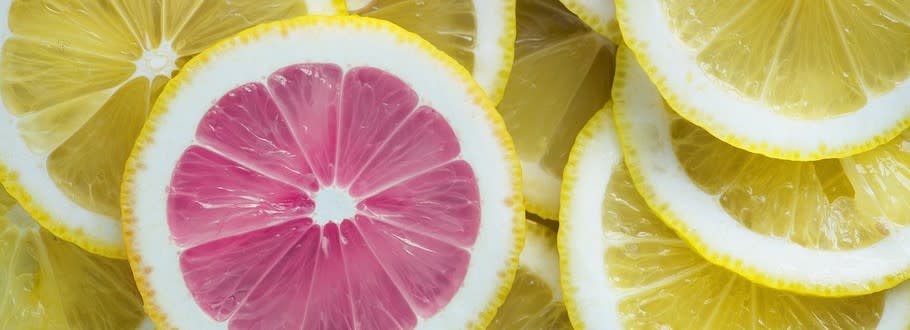 Close up on slices of lemon and grapefruit